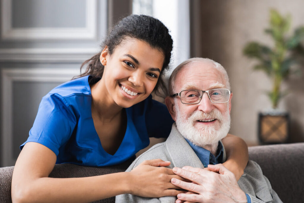 Caregiver with a smiling senior man