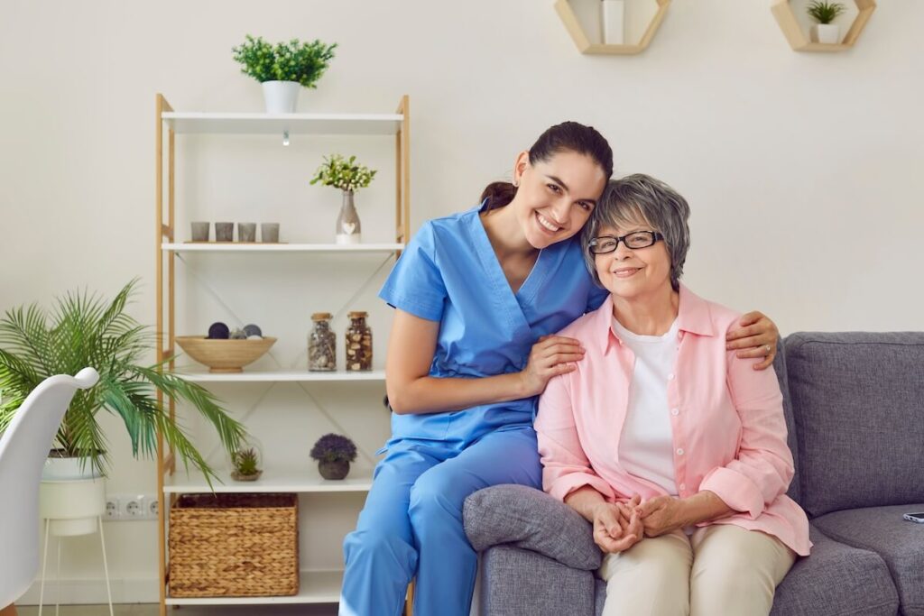 Caregiver with older woman in a living room